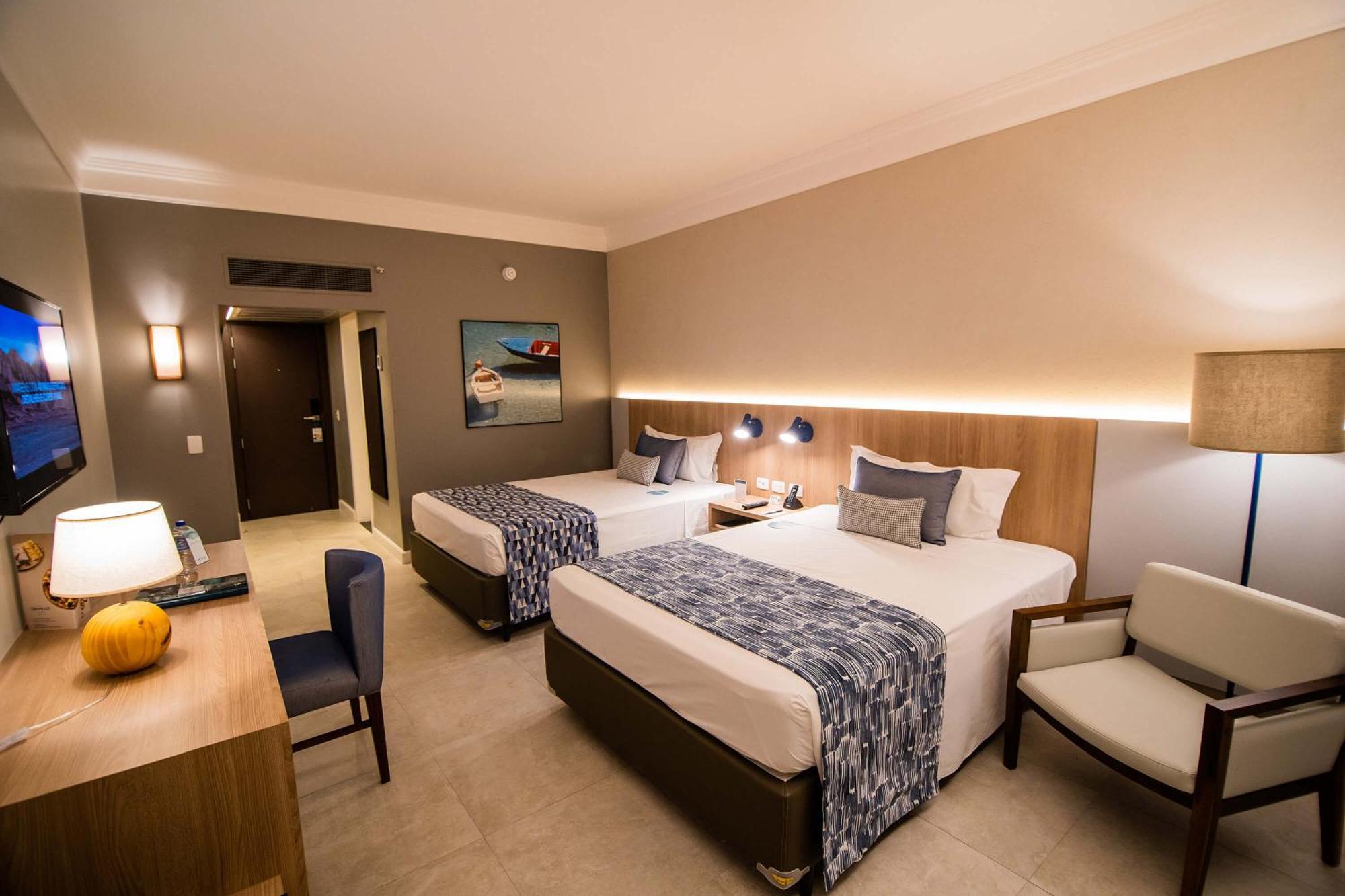 Quarto Premium com 2 Camas de Casal e Vista Mar